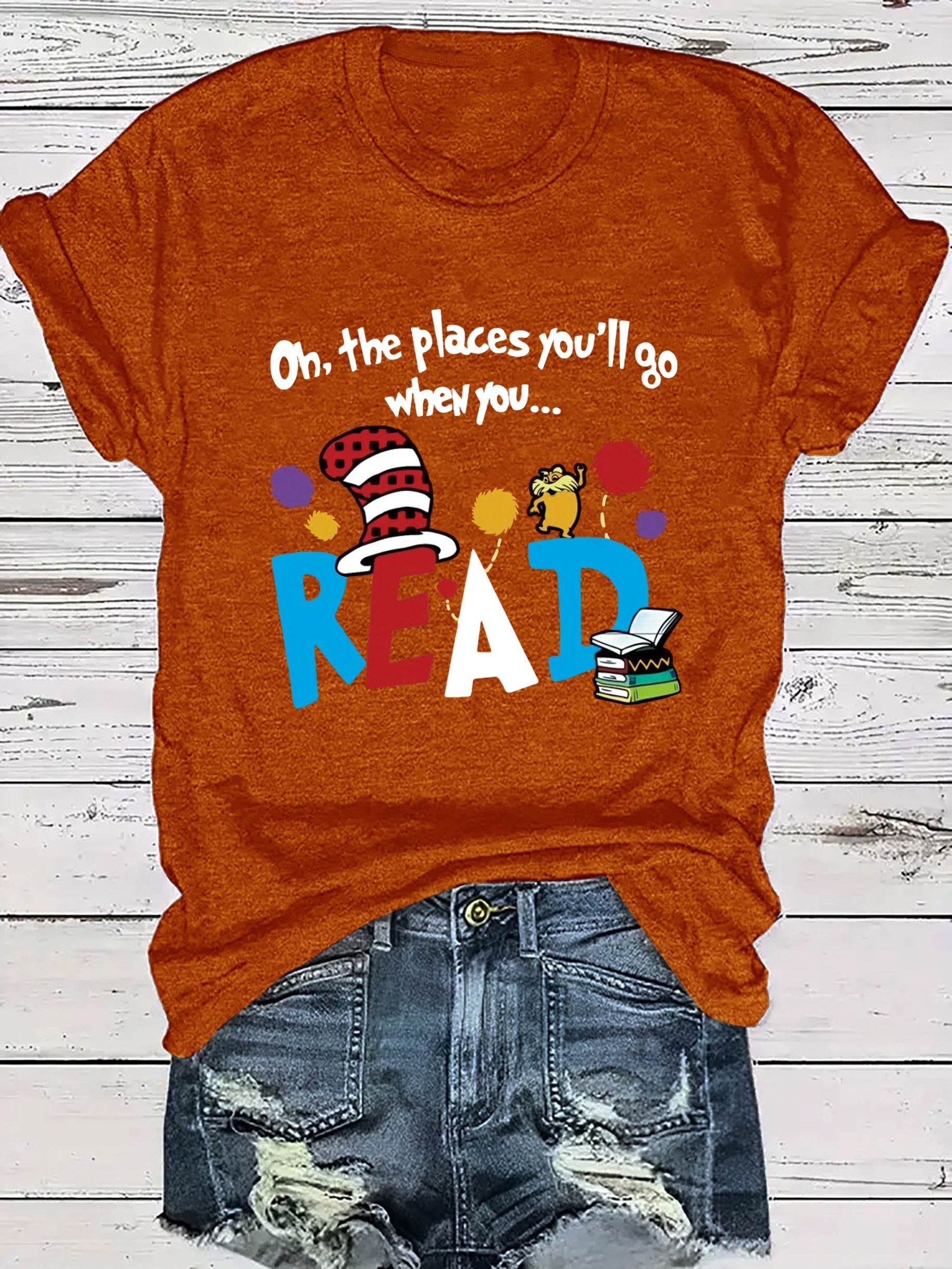 Women's Casual Short Sleeve T-Shirt - Vibrant Orange Cartoon Letter Print with Playful Book & Cat Design, "On the Places You'll Go" Graphic, Soft Stretch Round Neck Tee for Summer & All-Season Wear, Ladies T Shirts, Comfortable Tee, Playful Design,