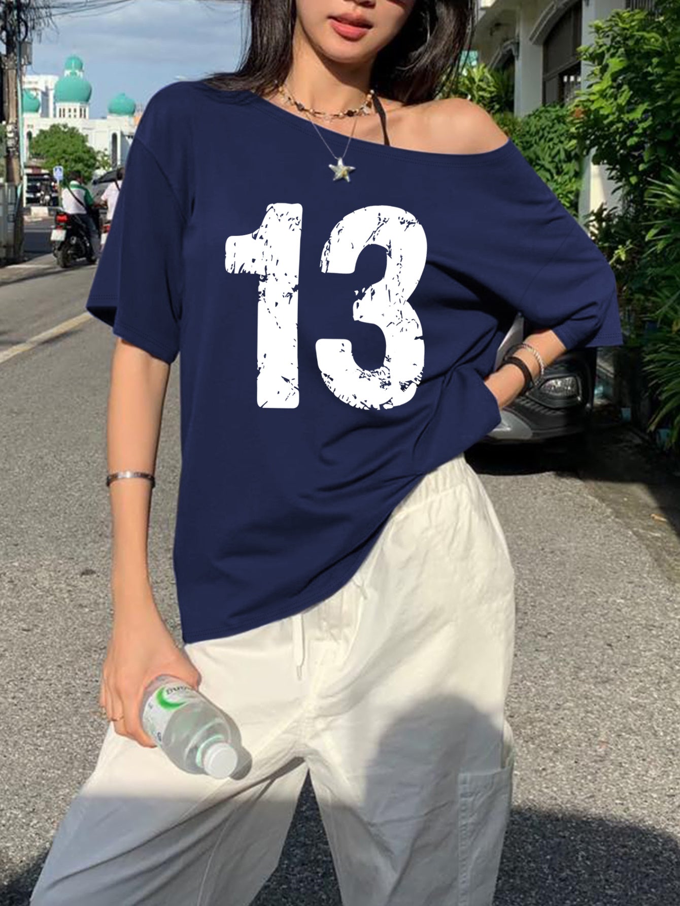Y2K Women'S T-Shirt with a Printed Asymmetrical Neckline And Off-Shoulder Design in Number 13.