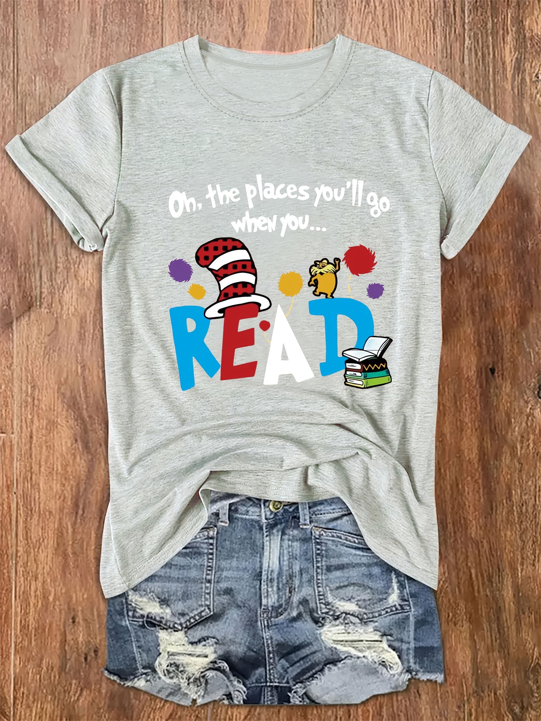 Women's Casual Short Sleeve T-Shirt - Vibrant Orange Cartoon Letter Print with Playful Book & Cat Design, "On the Places You'll Go" Graphic, Soft Stretch Round Neck Tee for Summer & All-Season Wear, Ladies T Shirts, Comfortable Tee, Playful Design,